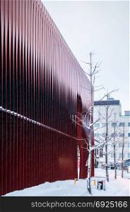 Red architecture exterior of Aomori Nebuta Warasse in winter with snow