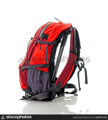 Red backpack, isolated over white.