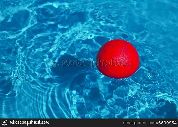 Red Ball Floating In A Swimming Pool