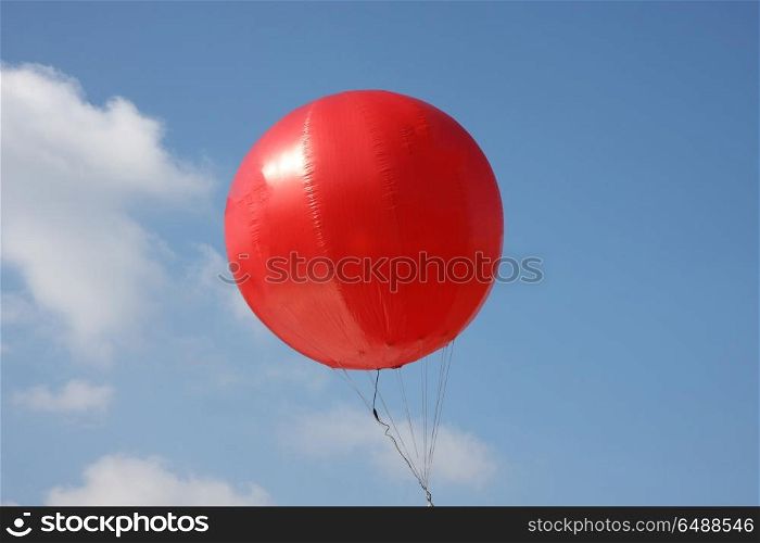 Red balloon high in the sky in Belgrade,Serbia