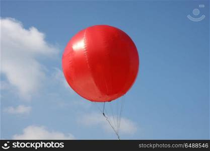 Red balloon high in the sky in Belgrade,Serbia