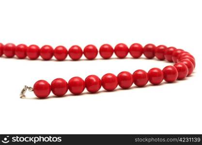 Red beads isolated on white background