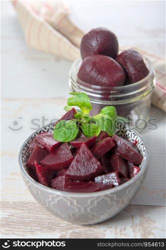 red beetroot cutting into pieces in a bowl