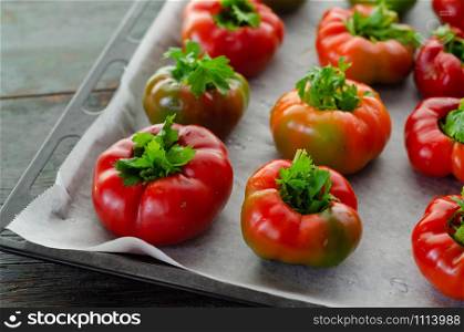Red bell peppers on the tray.