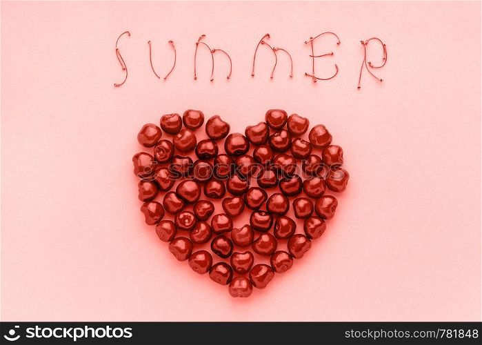 Red berry sweet cherries in shape of heart and text Summer of trendy coral shade, color of the year 2019 Template for postcard or your design Flat lay Top view.. Red berry sweet cherries in shape of heart and text Summer of trendy coral shade, color of the year 2019 Template for postcard or your design Flat lay Top view