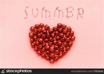 Red berry sweet cherries in shape of heart and text Summer of trendy coral shade, color of the year 2019 Template for postcard or your design Flat lay Top view.. Red berry sweet cherries in shape of heart and text Summer of trendy coral shade, color of the year 2019 Template for postcard or your design Flat lay Top view