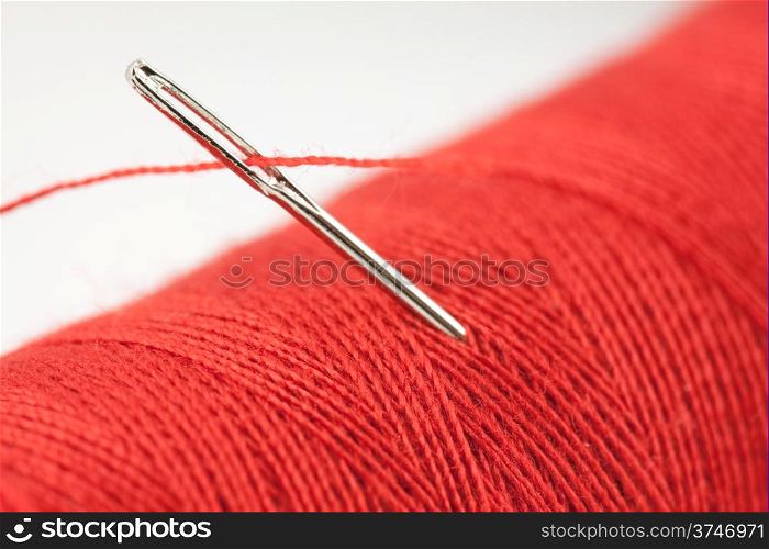 Red bobbin and needle
