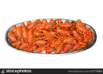 Red boiled crawfishes on the table in oval dish&#xA;