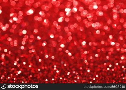 Red bokeh holiday textured glitter background