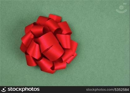 red bow on a green background