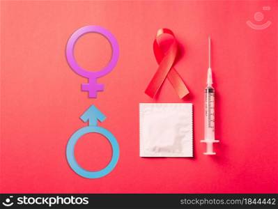 Red bow ribbon symbol HIV, AIDS cancer awareness, condom, syringe with shadows and Male, female gender signs isolated on red background, Healthcare medicine sexually concept, World AIDS Day