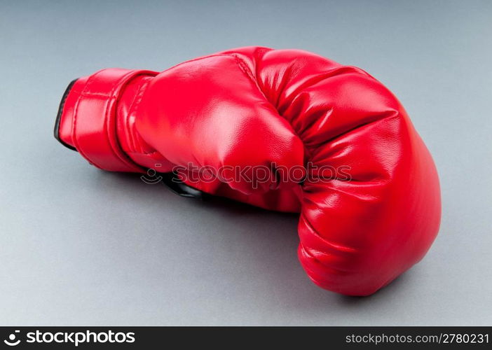 Red boxing gloves on the background