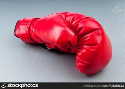 Red boxing gloves on the background