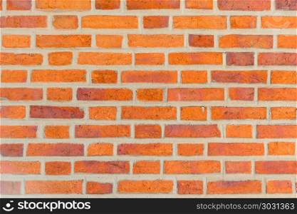 Red brick building wall background close up