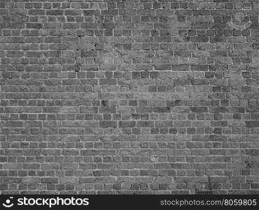 Red brick wall background. Red brick wall useful as a background in black and white