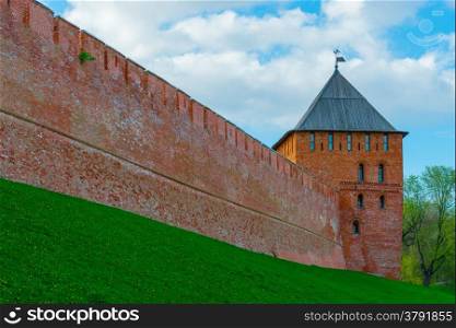 red brick wall of the Kremlin and the tower. Veliky Novgorod, Russia