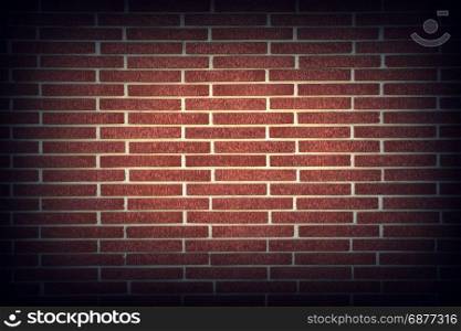 Red brick wall texture background with vignetting corners