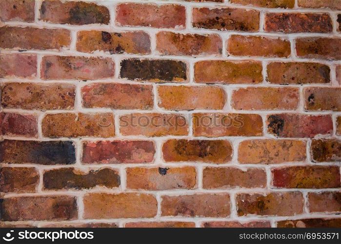 Red brick with an orange tint texture.