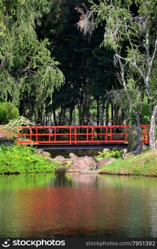 Red bridge in Chinese Garden located in Singapore