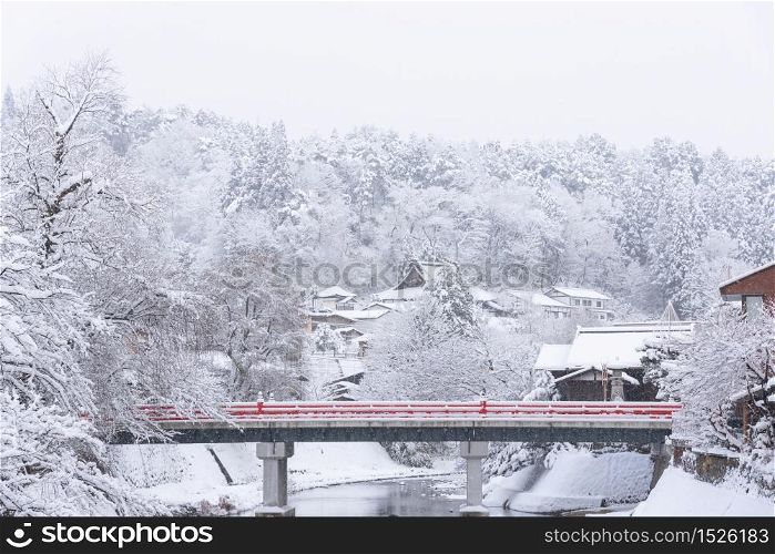 Red bridge of Takayama cover by snow in winter.
