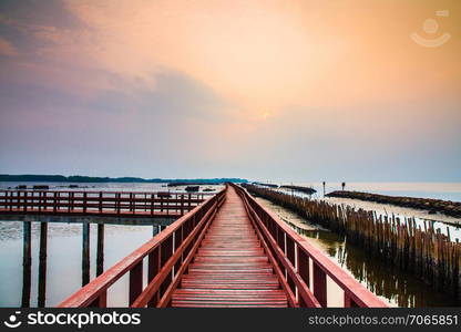 red bridge travel in morning at sea and beach sunlight beauty in nature