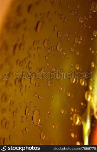 Red brown abstract blurred liquid background with soap bubbles