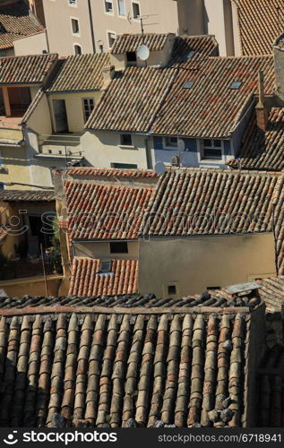 Red brown rooftops in Malaucene a small village in the Provence