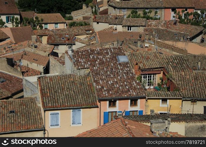 Red brown rooftops in Malaucene a small village in the Provence