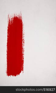Red brush stroke isolated on grunge background