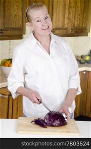 red cabbage is prepared from a housewife in her 50s