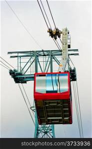 Red cabin of a chair lift at Mount Tahtal?. Turkey.