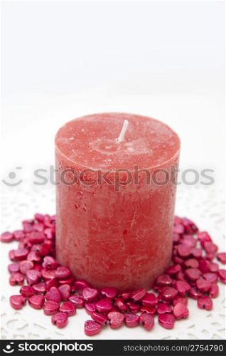 red candle on a white background