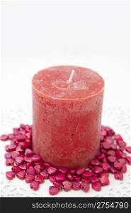 red candle on a white background