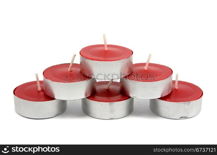 red candles stack isolated on white background