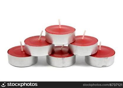 red candles stack isolated on white background