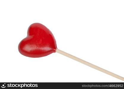 Red candy with shaped heart isolated on a white background