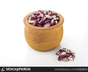 Red Cannellini beans in a wooden bowl