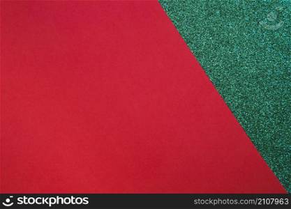 red cardboard paper green surface