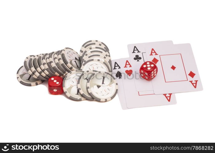 Red casino dice, four aces playing cards and casino chips