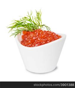 Red caviar in a porcelain bowl with a sprig of fennel closeup