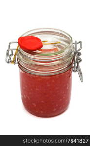 Red caviar in glass jar on a white background