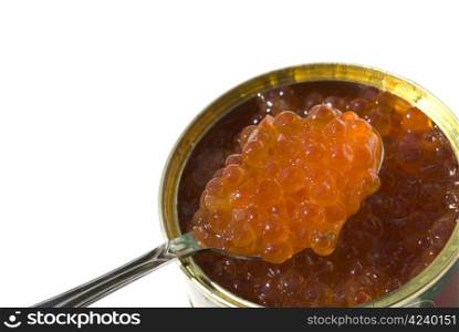 Red caviar on a spoon isolated on white.