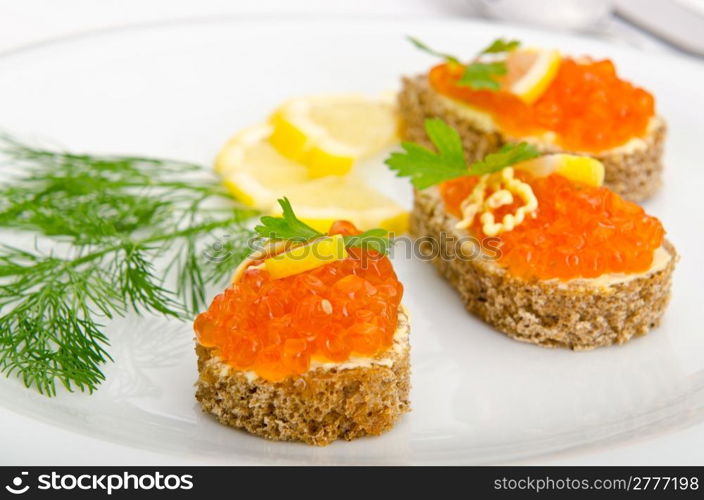 Red caviar served in the plate