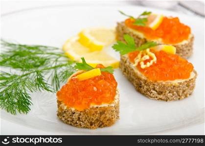 Red caviar served in the plate