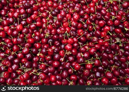 Red Cherries are small, round stone fruit that is typically bright or dark red.