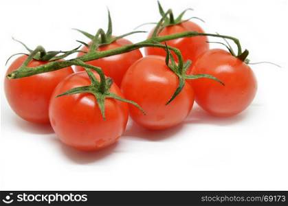 Red cherry tomato isolated on white background
