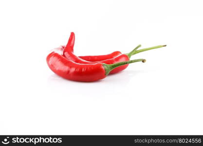 Red chili pepper on white background close up