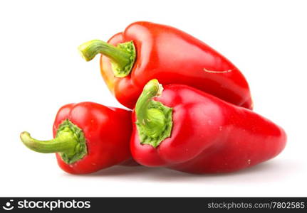 Red chilli peppers on white background.