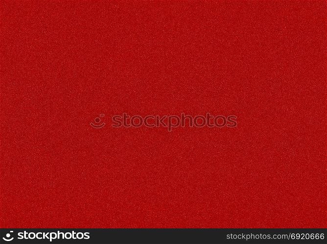 red Christmas background with shiny color speckles. red texture with shiny speckles of random colour noise useful as Christmas background