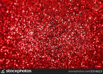 Red Christmas ball close-up. Shiny texture for wallpaper